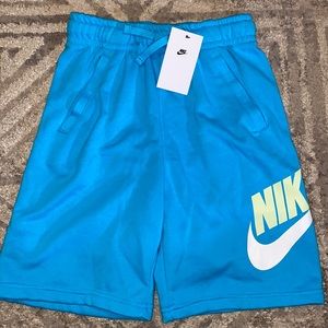 Boys Nike shorts sz Large . New with tags . Color is aqua blue